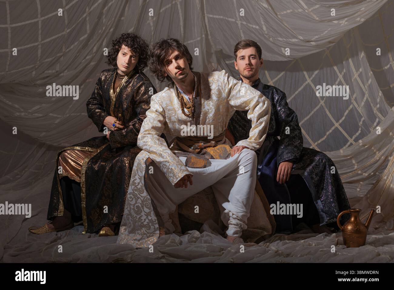 Arabic-style male fashion shoot featuring models in luxurious ...