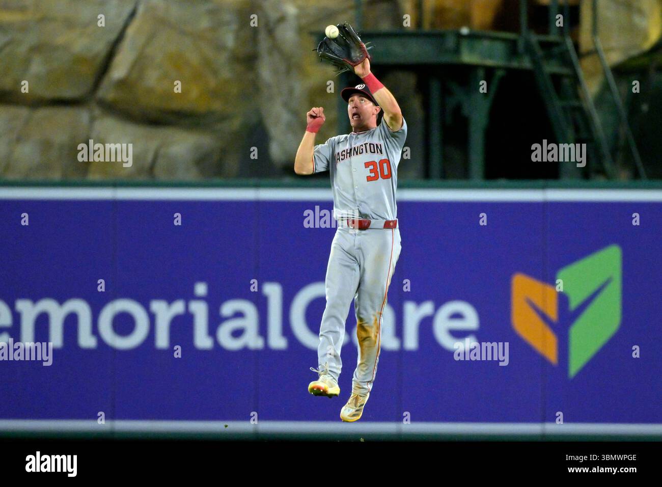 Washington Nationals center fielder Jacob Young makes a catch off a
