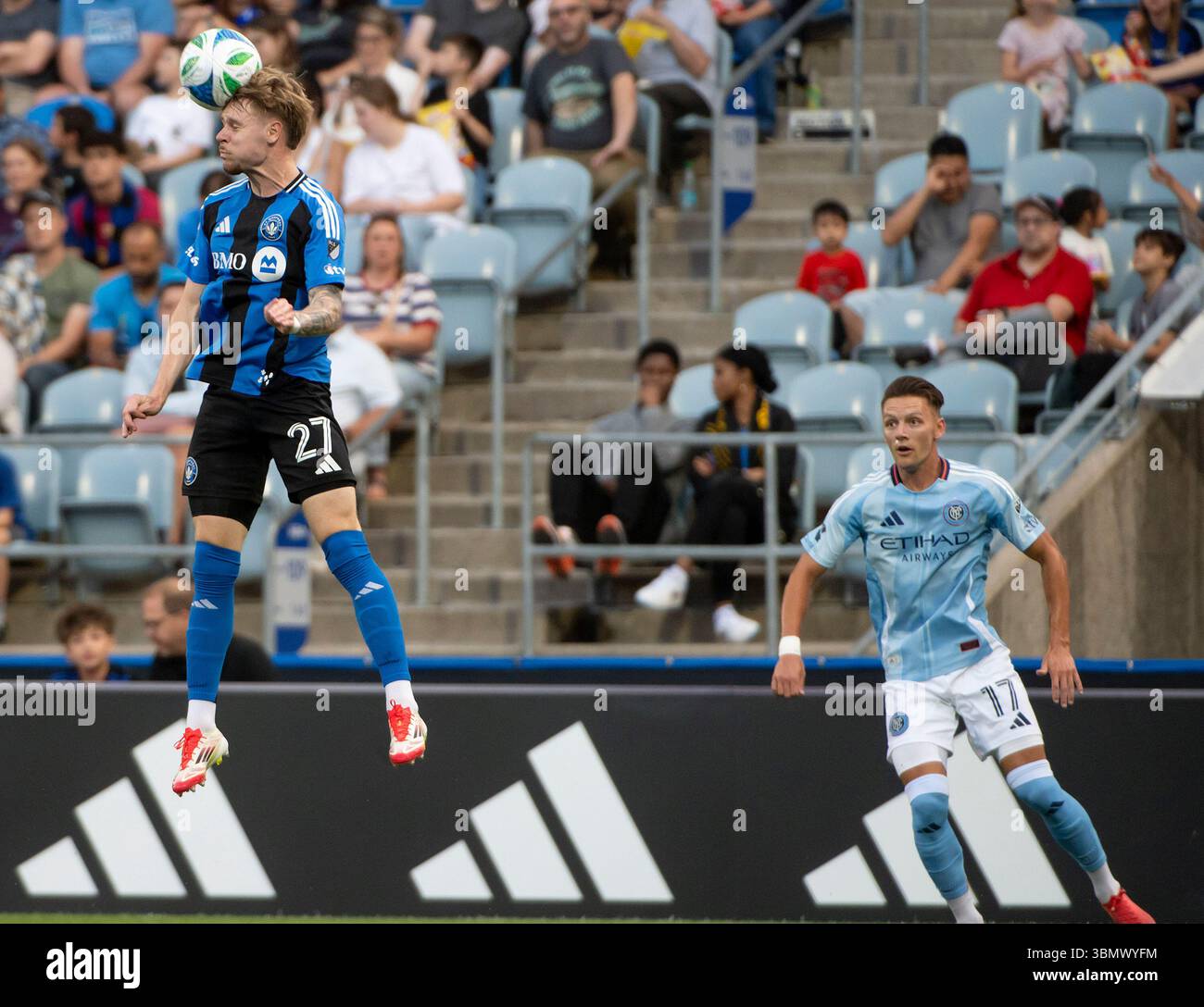 CF Montreal's Dawid Bugaj (27) heads the ball as New York City FC's