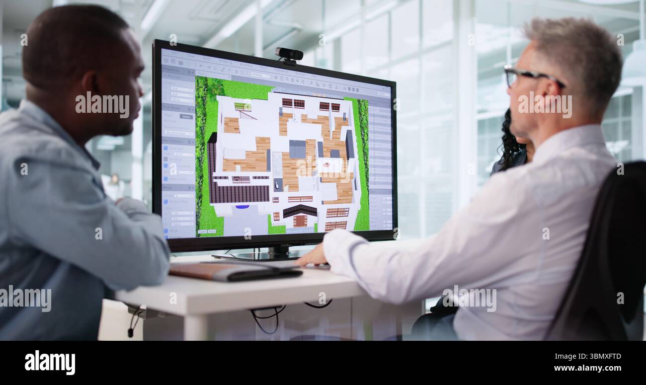Real Estate Agent Using CAD Software To Remodel Property Interior. Stock Photo