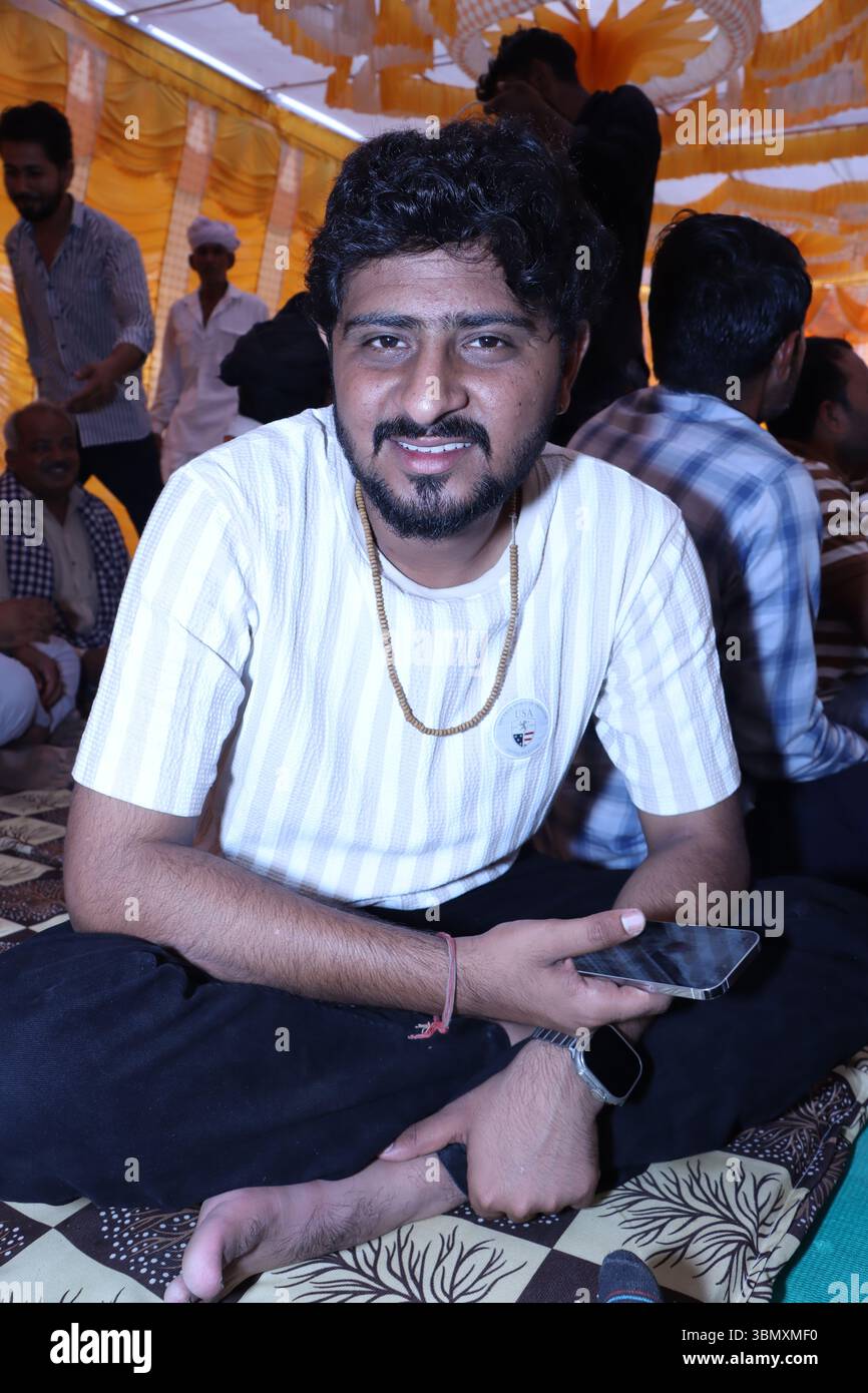 South indian man sitting on hi-res stock photography and images - Alamy