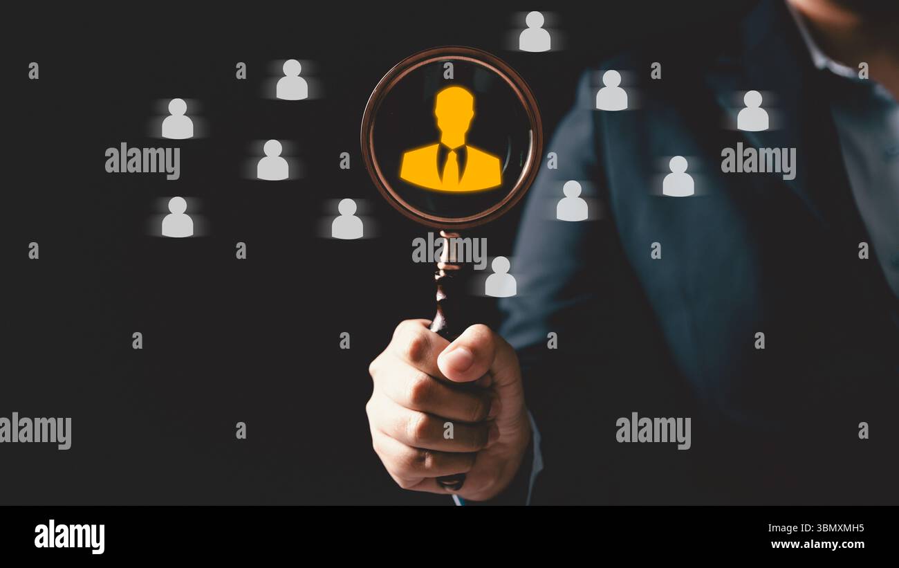 Magnifying glass highlighting candidate hi-res stock photography and ...