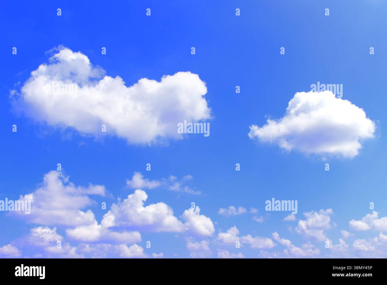 It is White clouds on the blue sky. Stock Photo