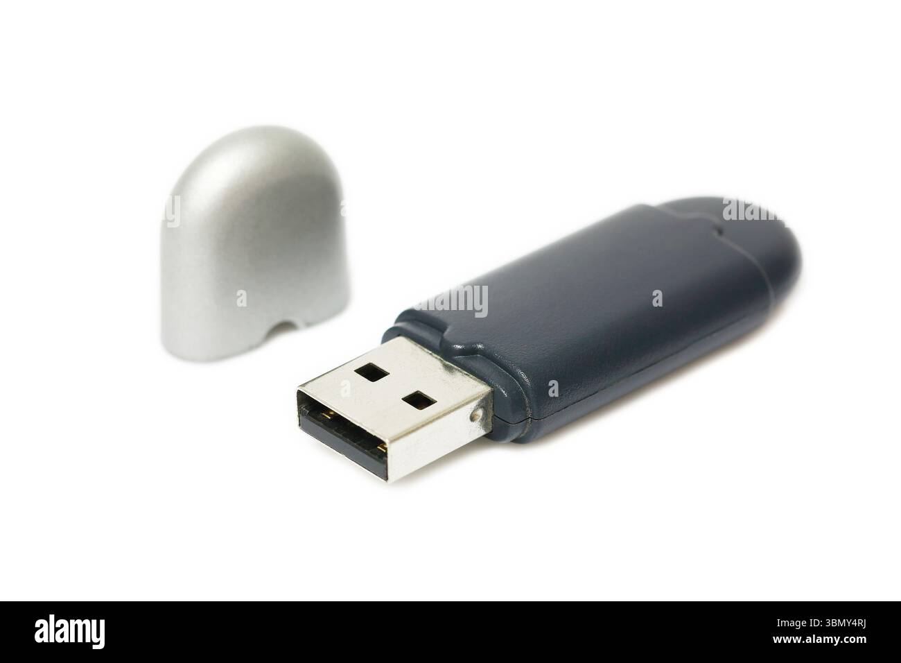 It is One external bluetooth usb with lid isolated on white. Stock Photo