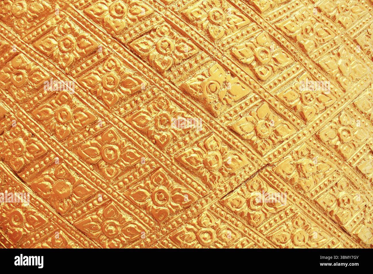 it is gold painted wall for pattern and background. Stock Photo