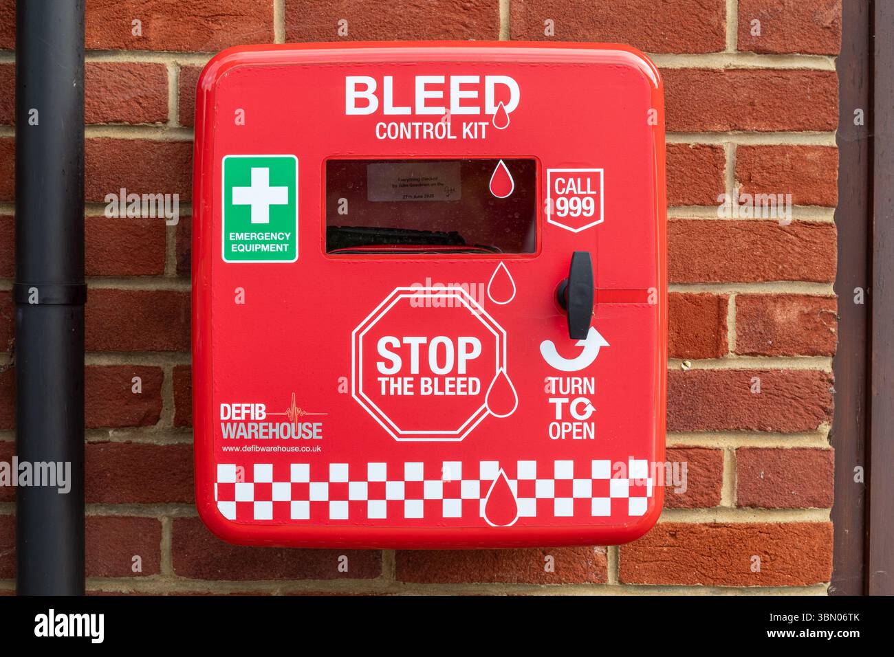 A Bleed Control Kit on wall of a village hall, to provide life-saving ...