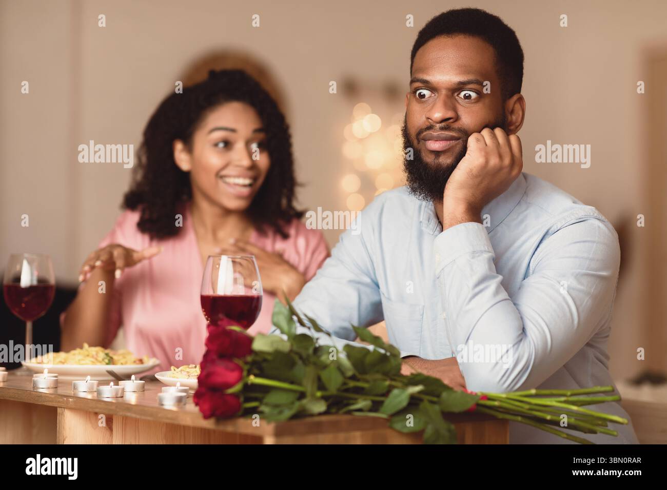 Black Couple On Unsuccessful Blind Date In Restaurant Stock Photo