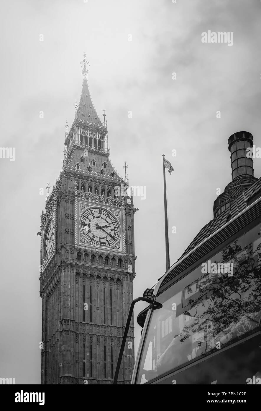View of Iconic Big Ben Elizabeth Tower with Red Double Decker Bus in London UK Stock Photo
