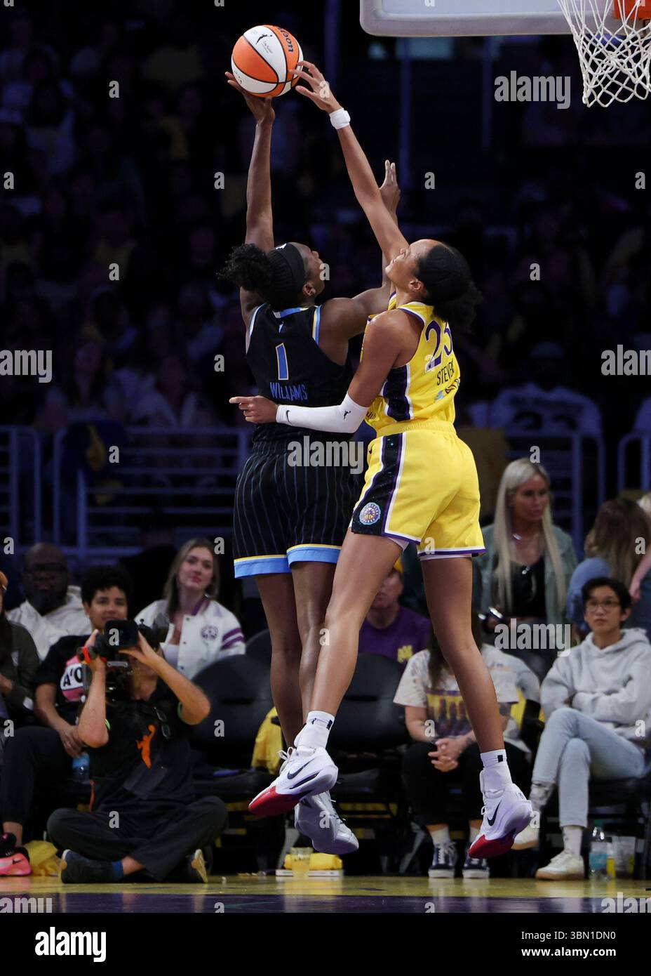 Los Angeles Sparks forward Azura Stevens, right, blocks a shot by ...