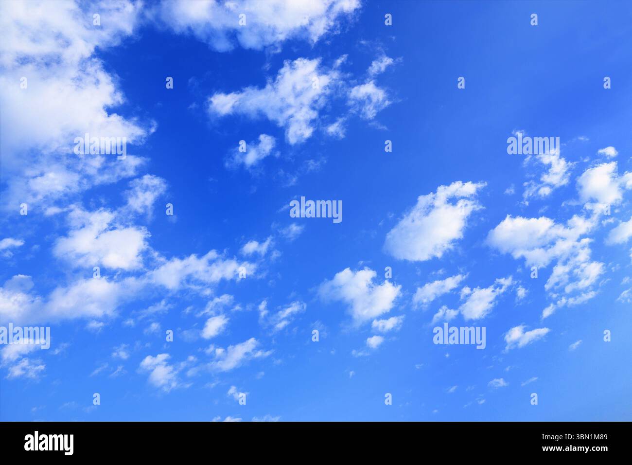 White wavy clouds in blue hi-res stock photography and images - Alamy