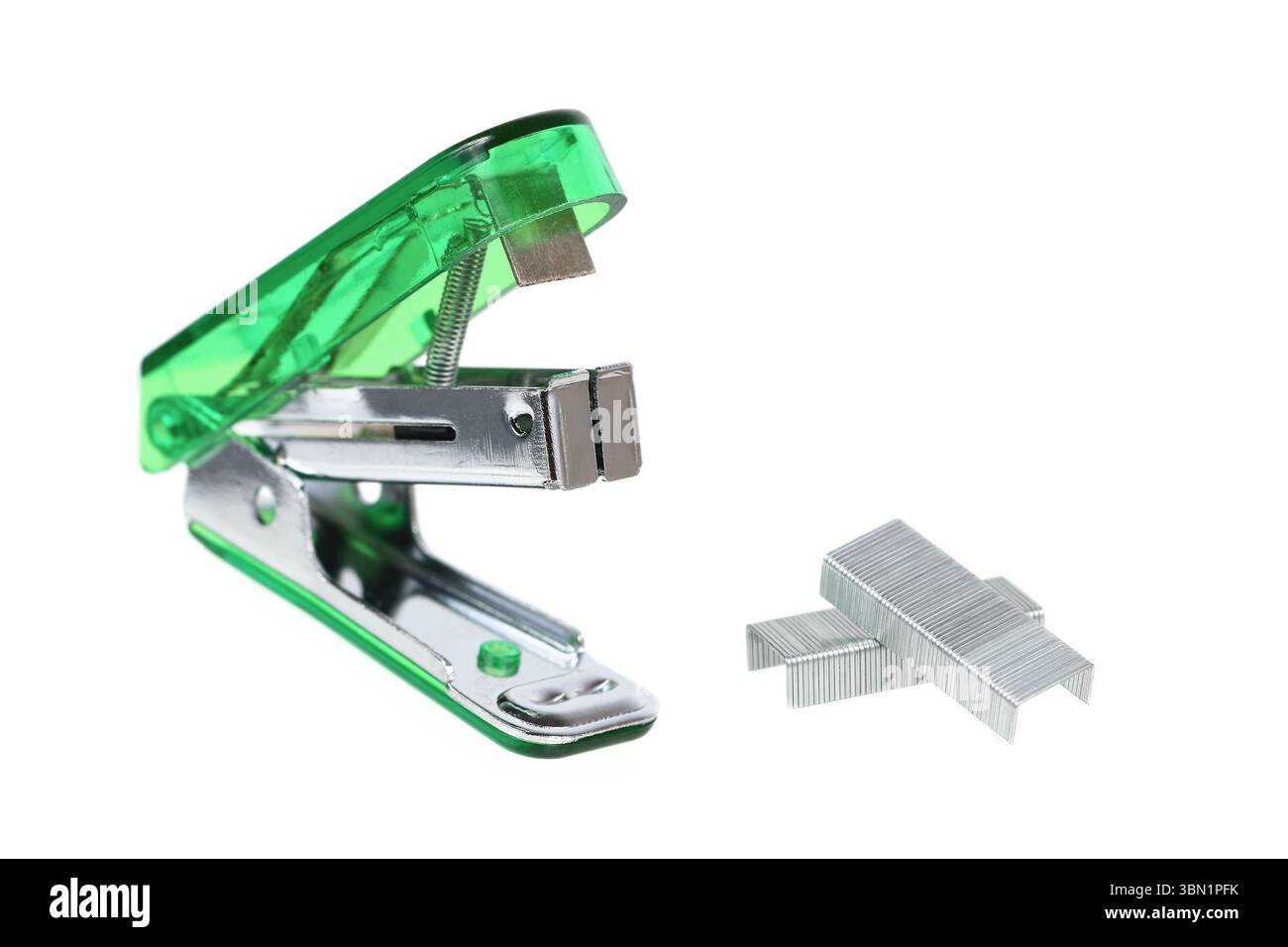 it is stapler and staples isolated on white. Stock Photo