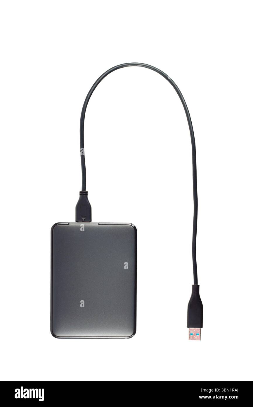 It is External hard disk with usb cable isolated on white. Stock Photo