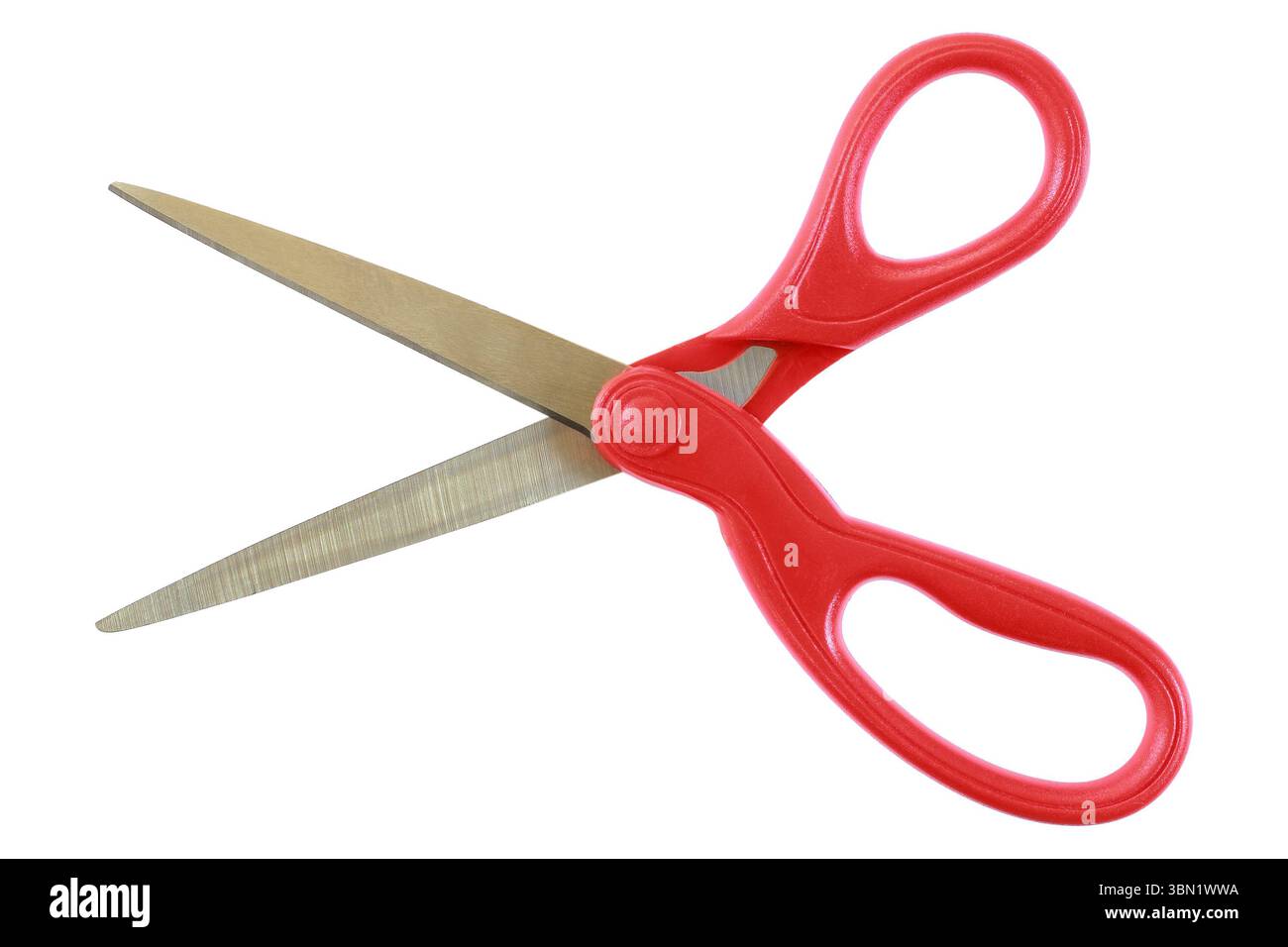 It is Open scissors with red handle isolated on white. Stock Photo