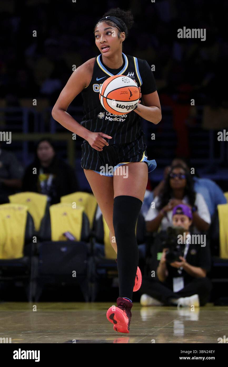 Chicago Sky forward Angel Reese dribbles during the first half of a ...
