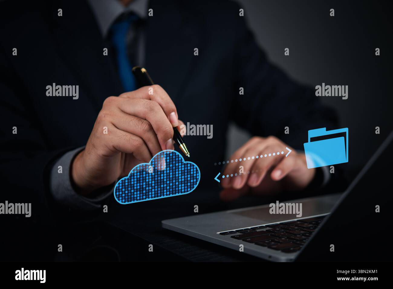 Businessman using cloud technology to transfer files to secure digital storage, concept for cloud computing solution and data backup. online managemen Stock Photo