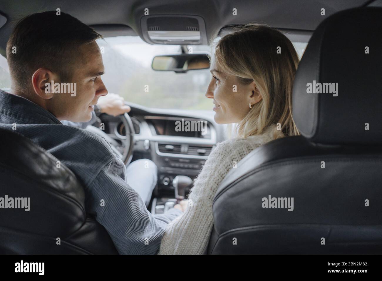 Loving couple in the car Stock Photo