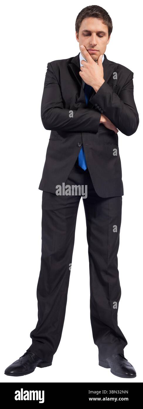 Thinking businessman touching chin Stock Photo
