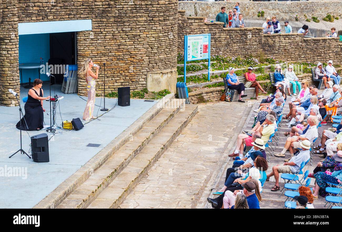 Opera Singers on the Terraces Stage at Rottingdean during Arts Festival Singing to Audience on Sea Front Stock Photo
