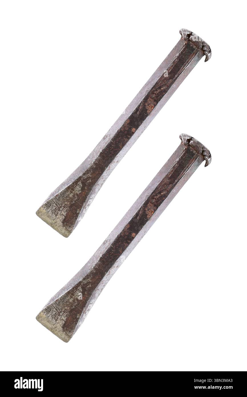 it is two used steel chisels isolated on white. Stock Photo
