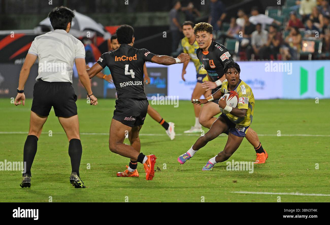 Mumbai, India. 29th June, 2025. Sukumar Hembrom (R) of Hyderabad Heroes in action during the Rugby Premiere League (RPL) semifinal match played between Bengaluru Bravehearts and Hyderabad Heroes. Final score; Chennai Bulls defeated Delhi Redz by 41-0. Credit: SOPA Images Limited/Alamy Live News Stock Photo