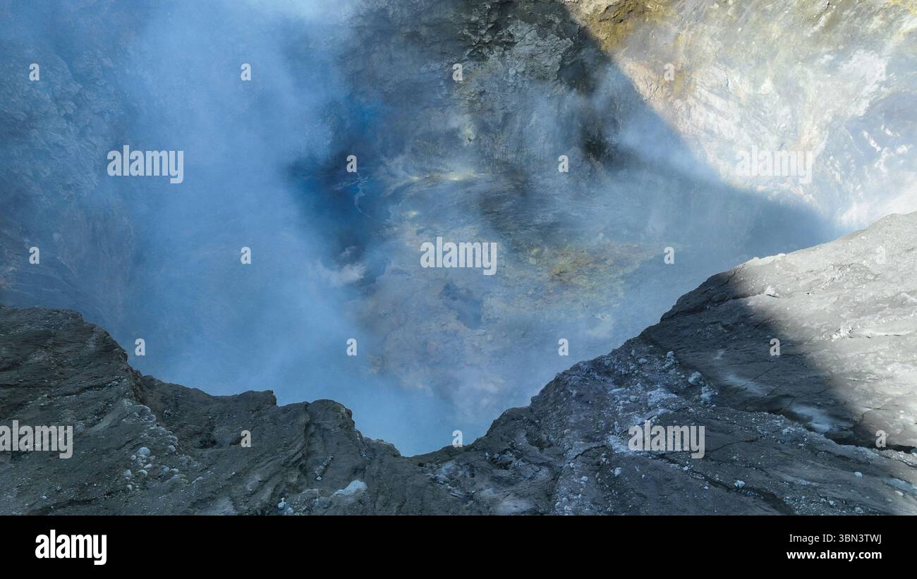 Volcano mount bromo emits smoke hi-res stock photography and images - Alamy