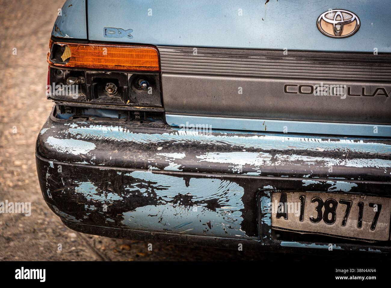 Dominican Republic, Santo Domingo province, Santo Domingo, Santo Domingo. Close-up of a Toyota Corolla in very poor condition. Stock Photo