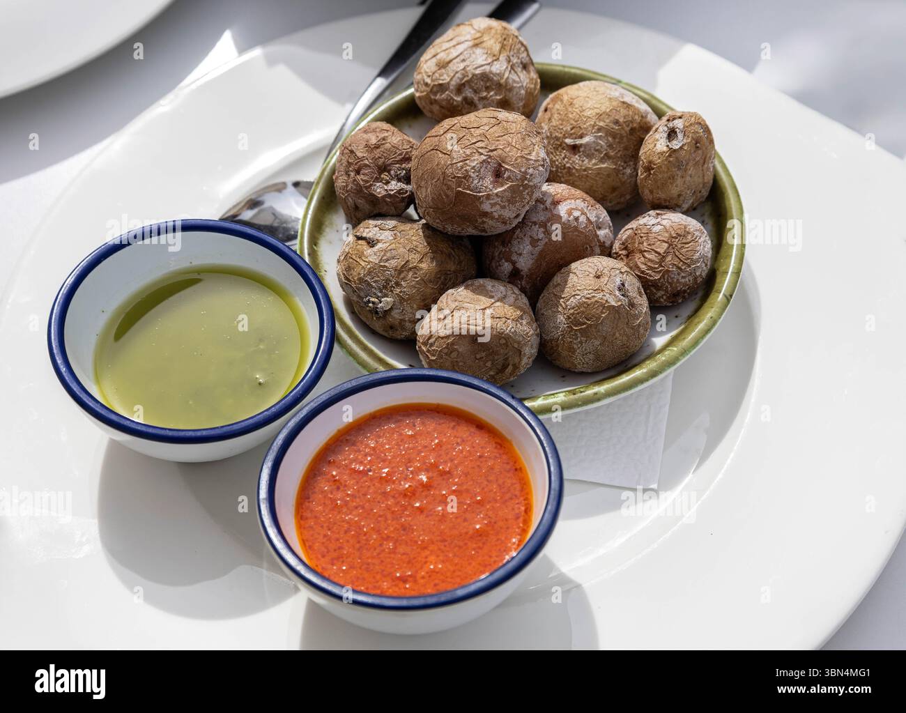 papas arrugadas with mojo sauce in tenerife, spain Stock Photo