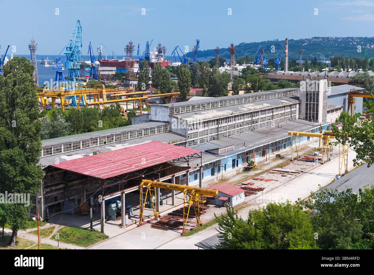 Shipyard against backdrop industrial hi-res stock photography and ...