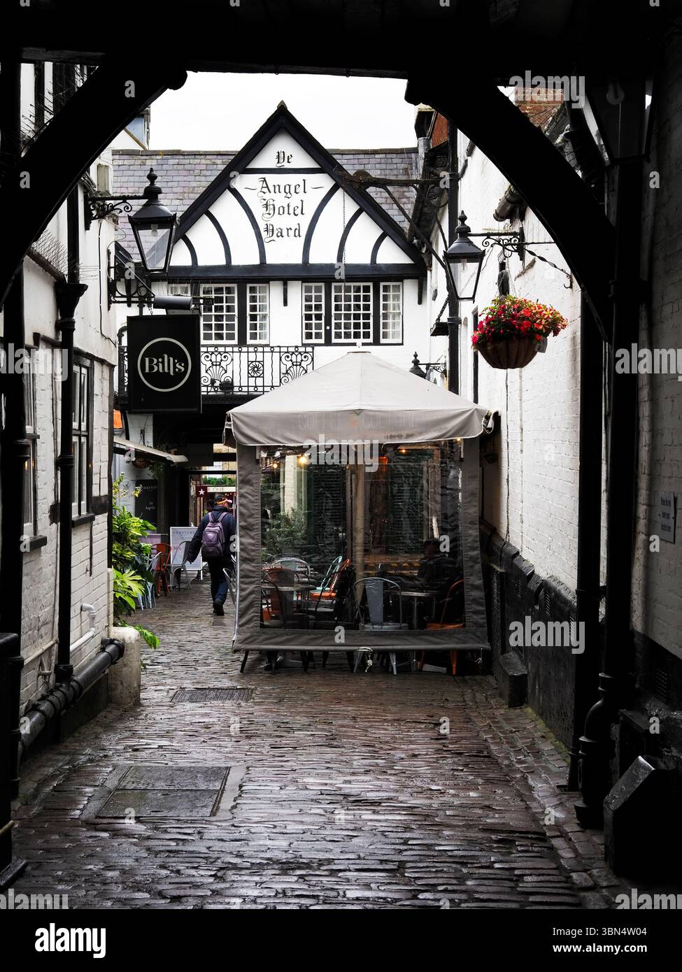 Angel Gate cobbled alleyway at the Angel Hotel off the High Street in Guildford Surrey England Stock Photo