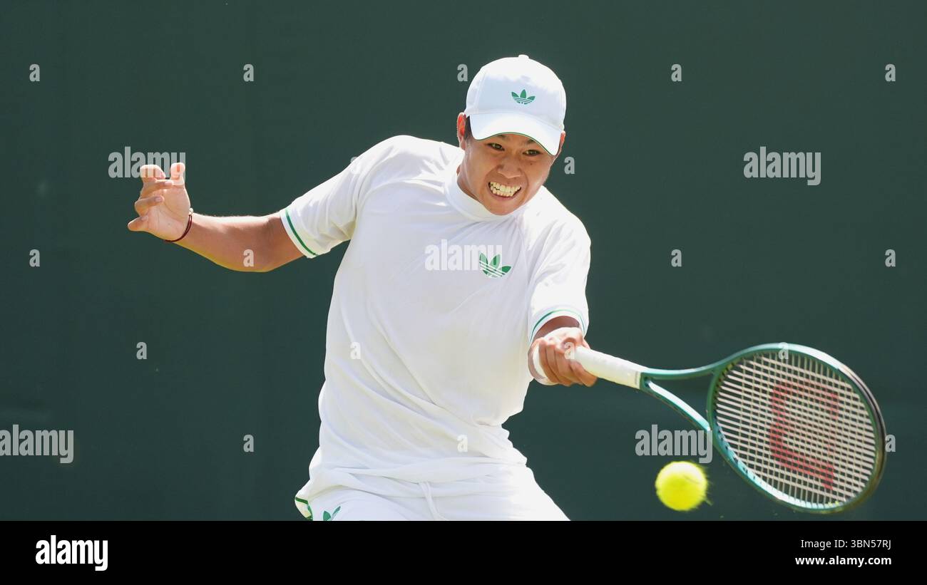USA's Learner Tien during their first round match of the Wimbledon ...