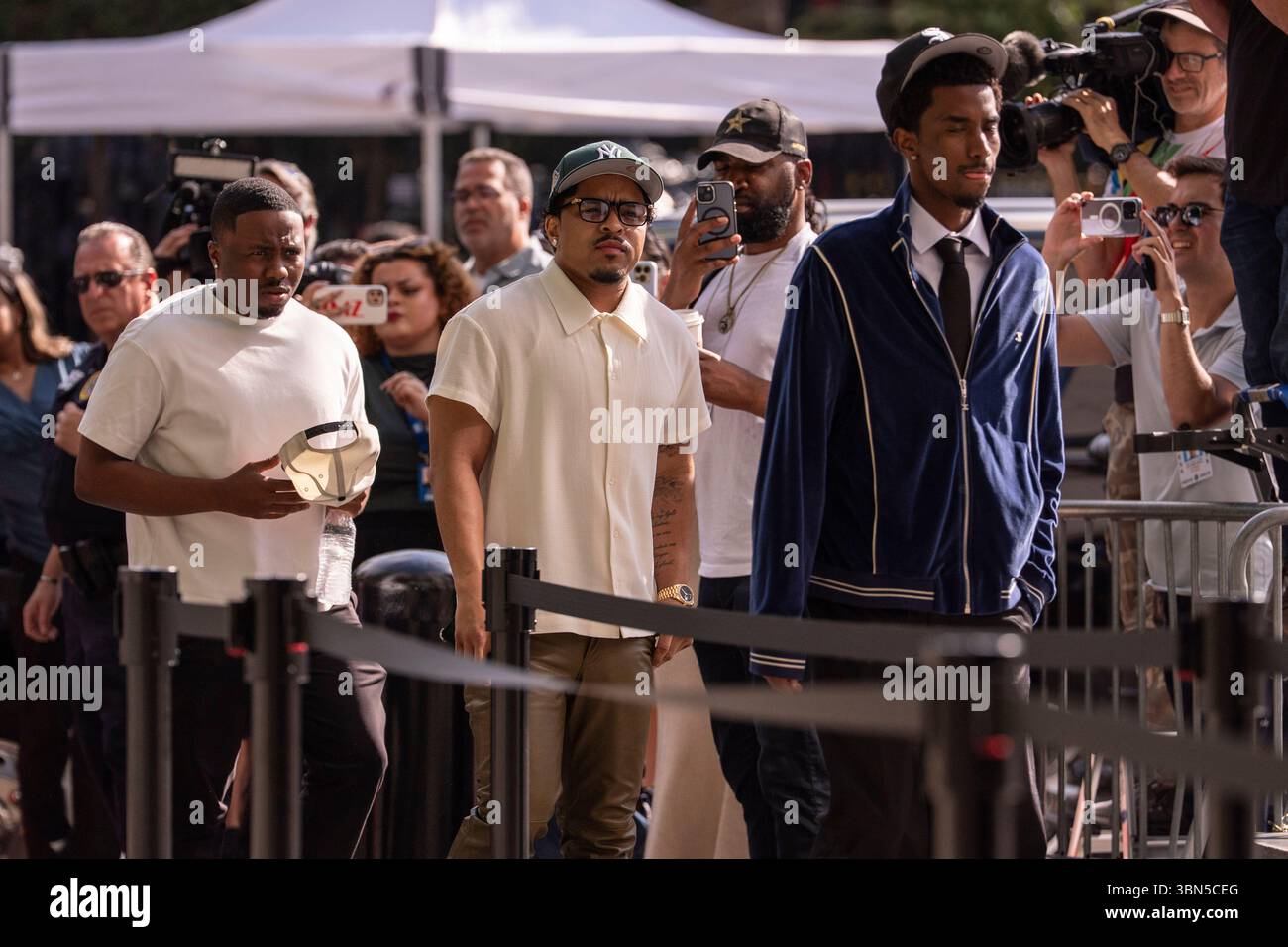 King Combs, right and Justin Dior, center, sons of Sean Combs, arrive