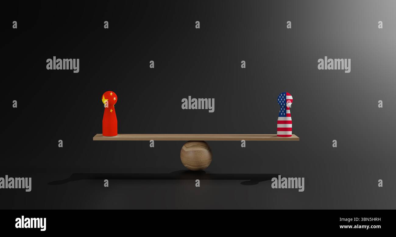 A doll with the Chinese flag and a doll with the American flag balanced ...