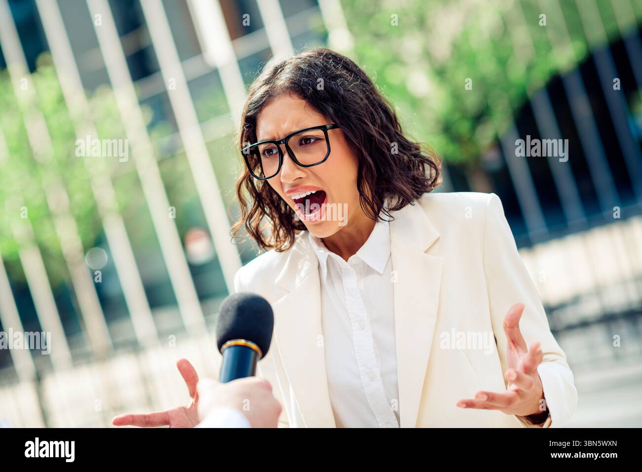 Angry scream at reporter hi-res stock photography and images - Alamy