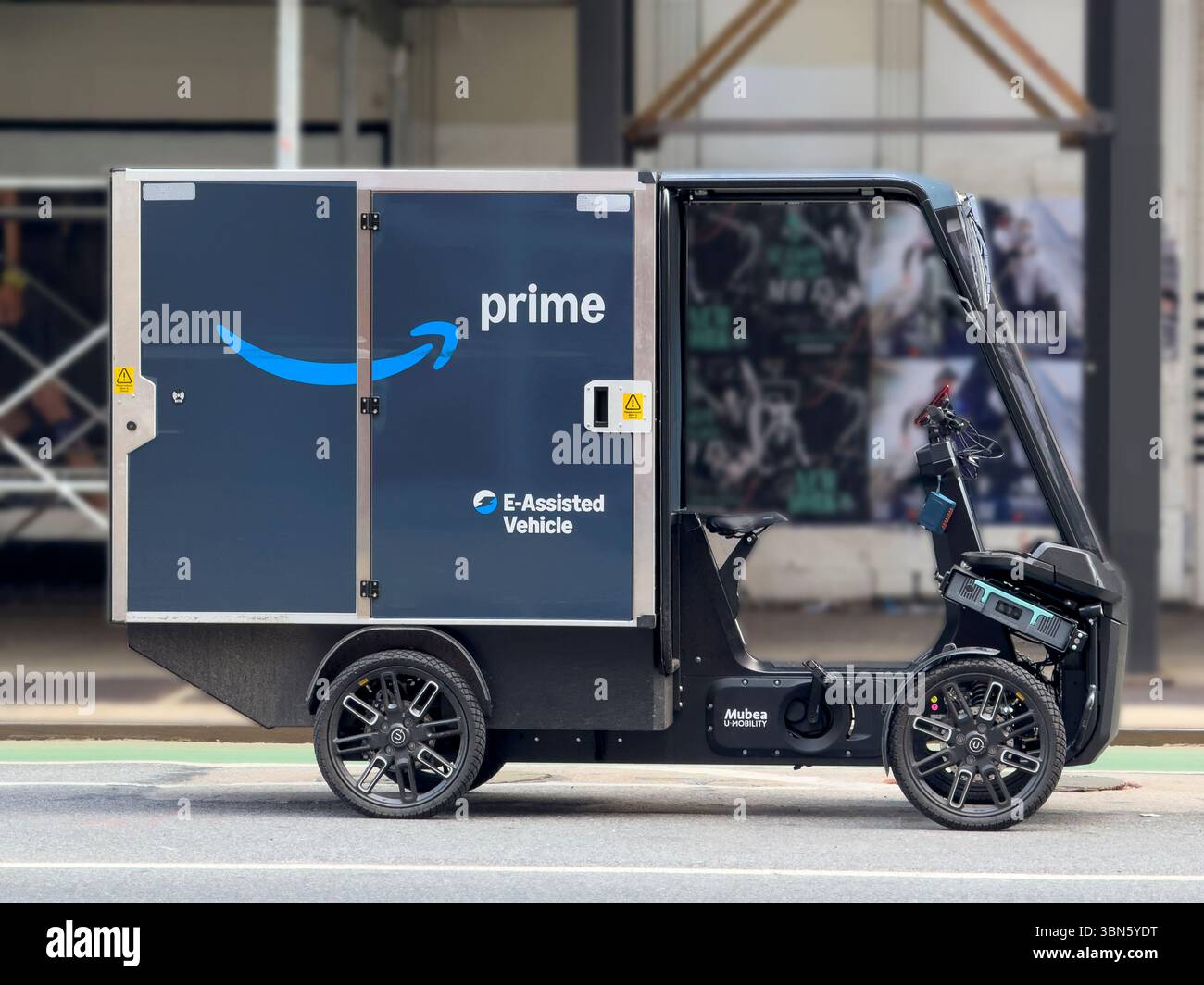 Amazon electric-assisted cargo bike parked on street, Manhattan, New York City, New York, USA Stock Photo