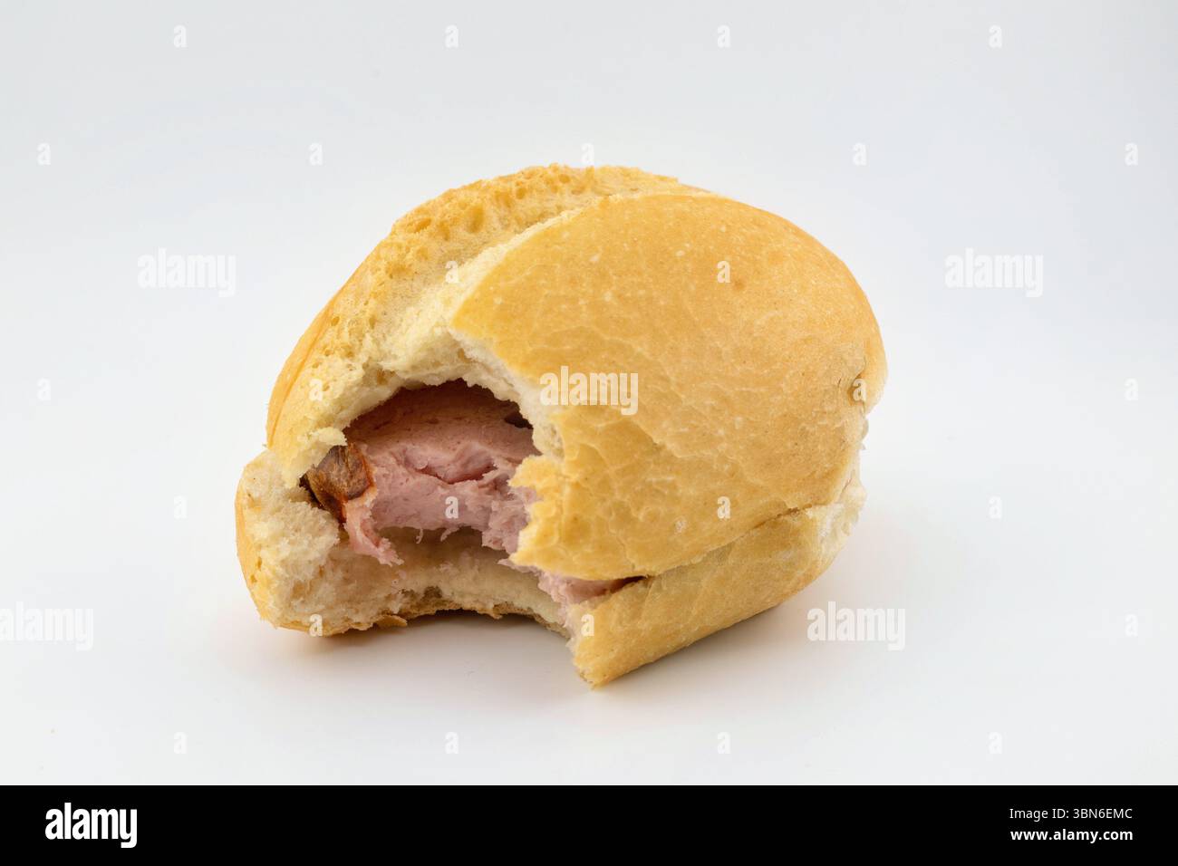 angebissenes Fleischkäsebrötchen Stock Photo