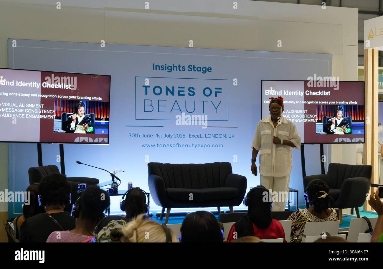 Speaker at the Tones of Beauty Exhibition, ExCel, London Stock Photo