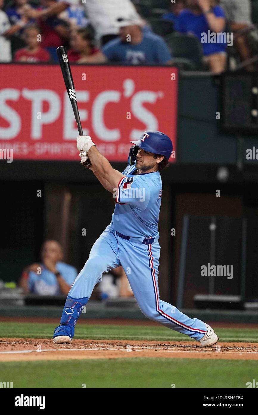 Texas Rangers' Josh Smith follows through on a swing during a baseball ...