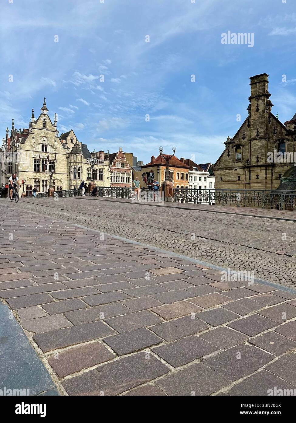 Historic cobblestone square with medieval guild houses on the Korenmarkt in Ghent (Gent), Belgium. - Smartphone Captured Stock Image