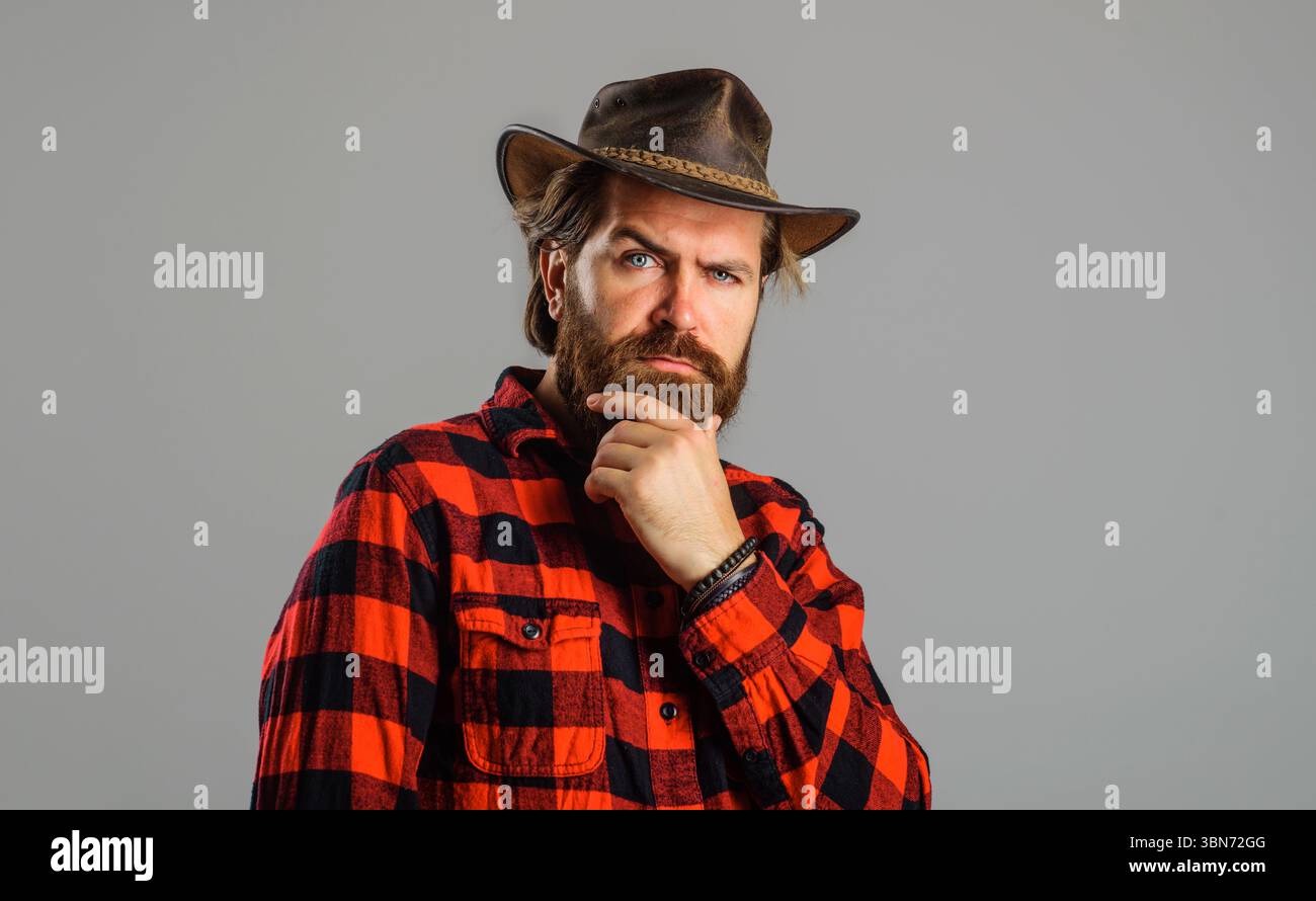 Leather cowboy hat. Portrait of serious bearded man in cowboy hat ...