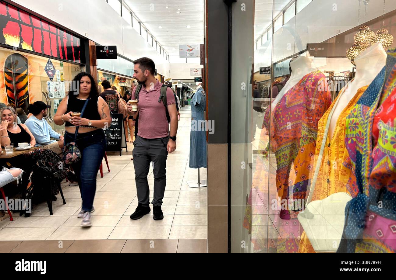 People walking through shopping arcade, Oceana Walk, Cairns, Queensland, Australia. No MR or PR - Smartphone Captured Stock Image