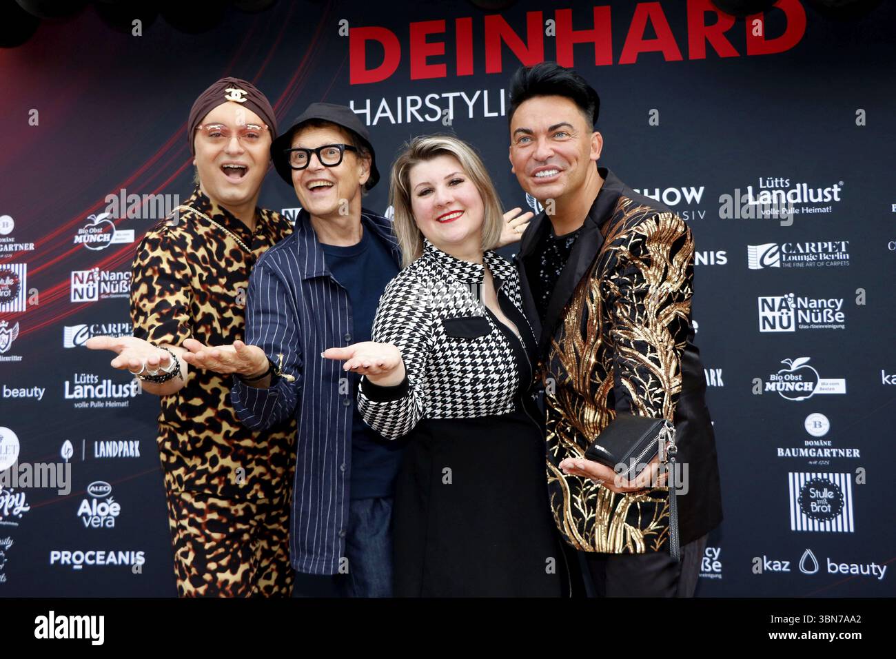 Julian F. M. Stoeckel, Rolf Scheider, Janine Becker and Matthias Mangiapane at the VIP opening of the new Deinhard Salon Am Muehlanger 3, Berlin, 28 J Stock Photo