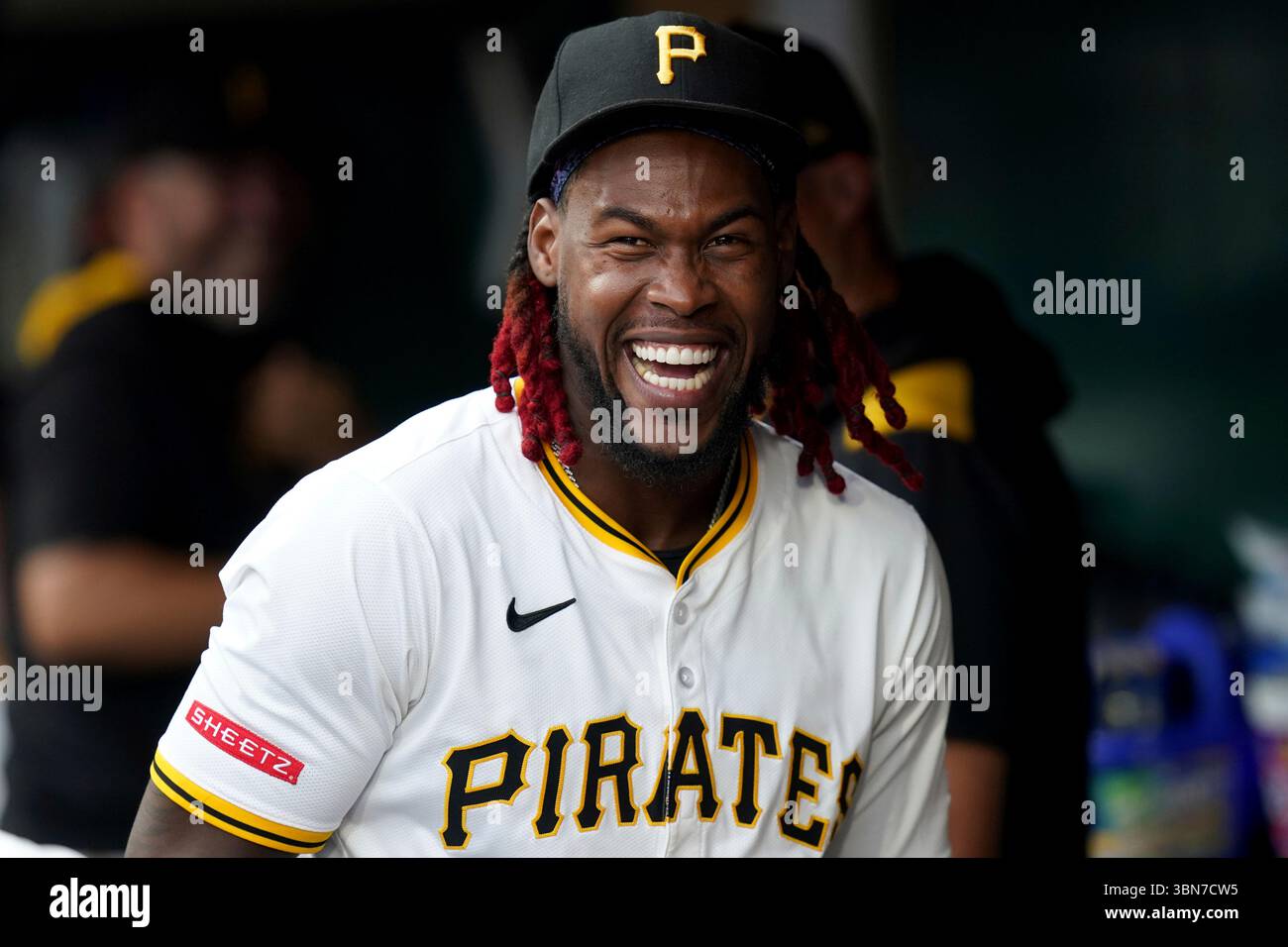 Pittsburgh Pirates' Oneil Cruz stands in the dugout before a baseball