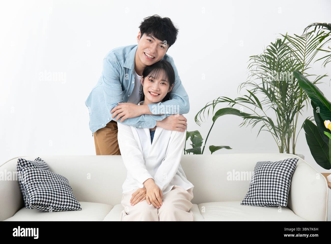 Happy asian couple wearing hi-res stock photography and images - Alamy