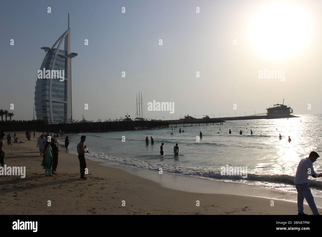 Burj Al Arab luxury hotel and Jumeirah public beach in Dubai city in UAE Stock Photo