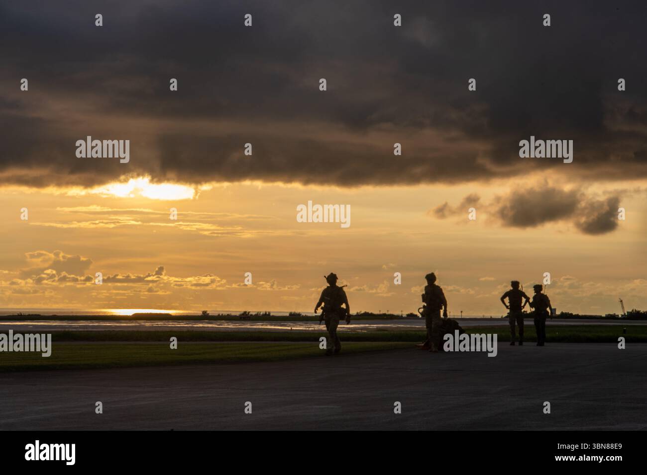 U.S. Air Force pararescuemen assigned to the 31st Rescue Squadron walk ...