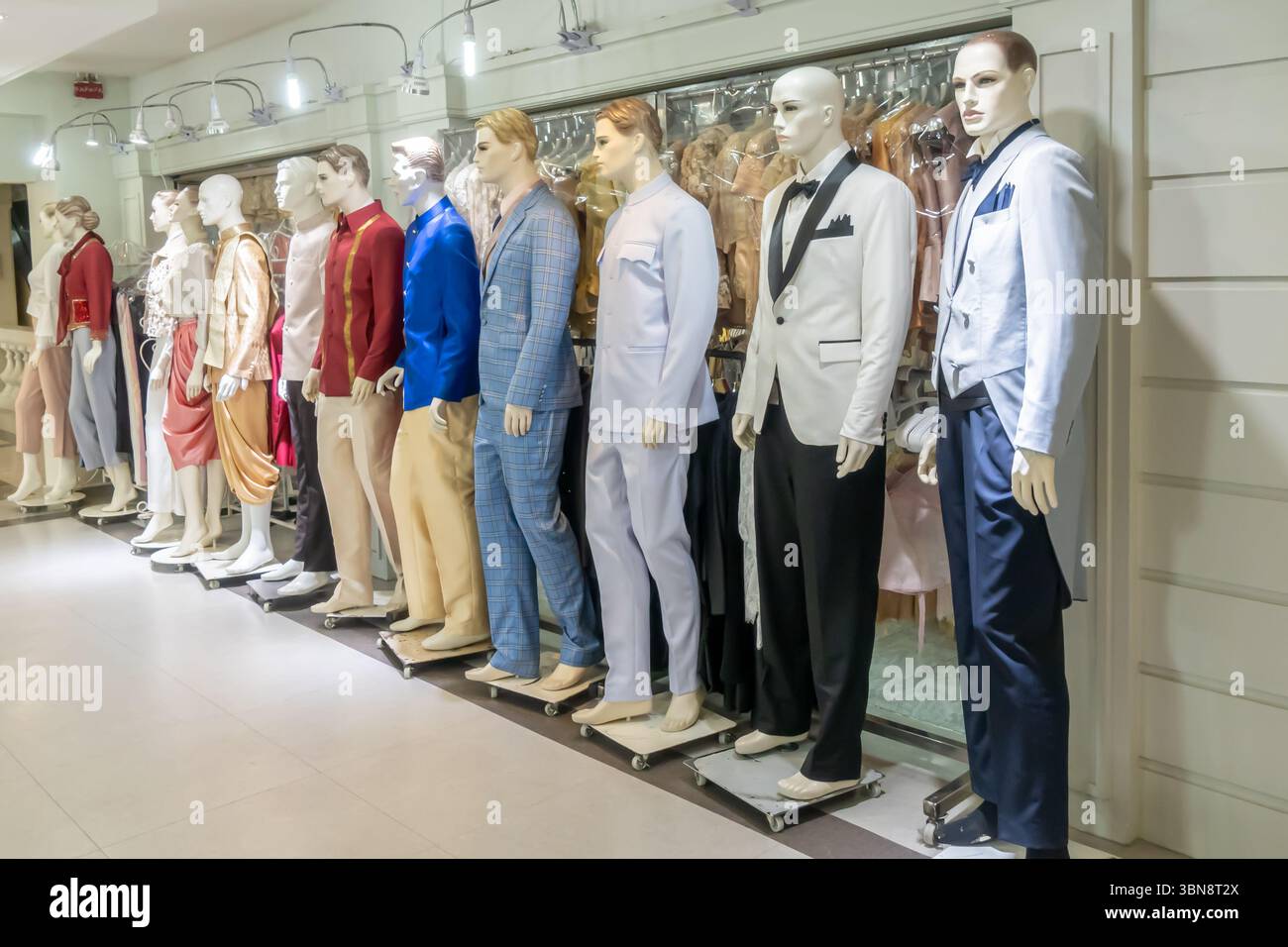 Men's suits displayed on mannequins in The Old Siam Plaza department store, Bangkok, Thailand Stock Photo