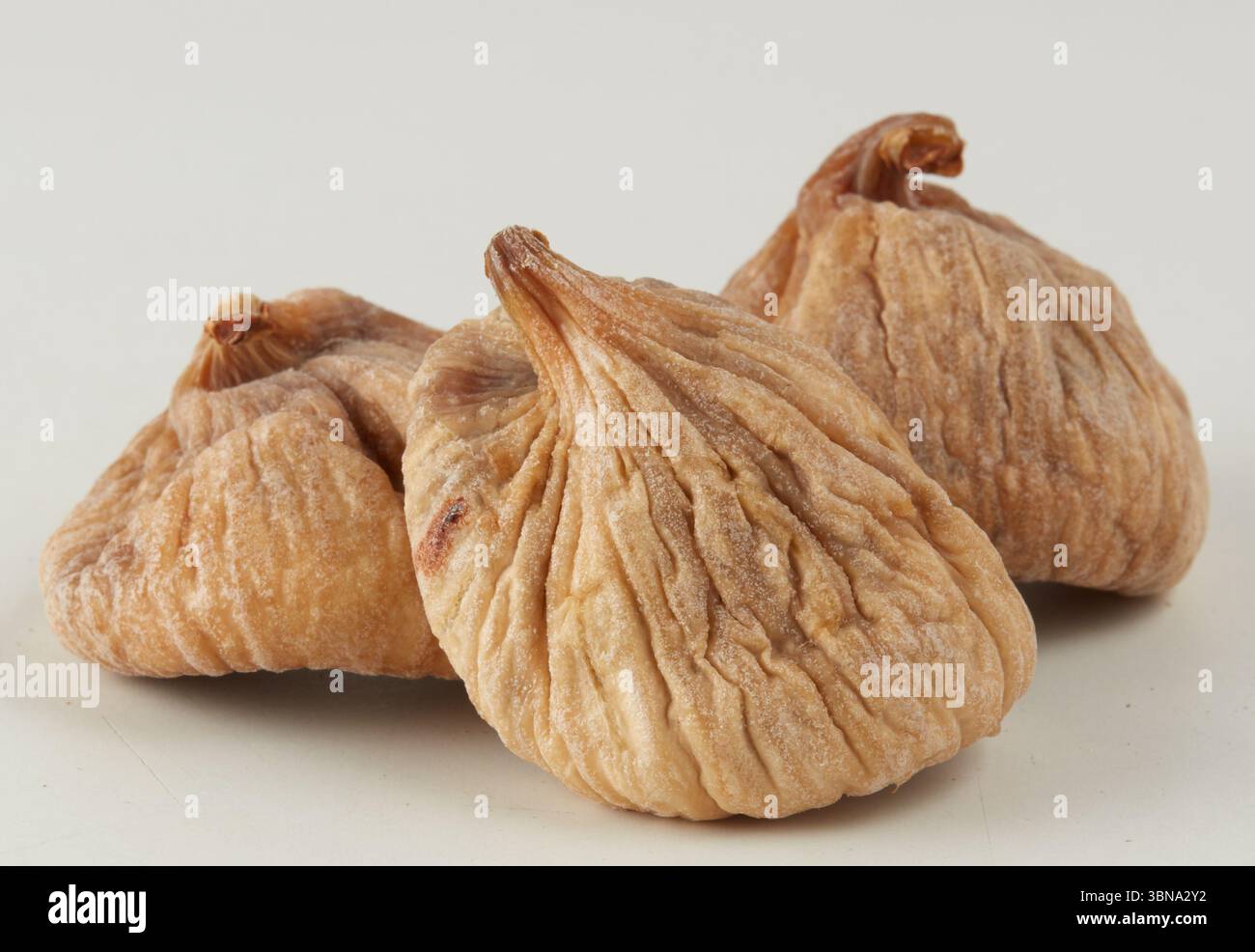 dried fig nuts isolated nature background with clipping path Stock Photo