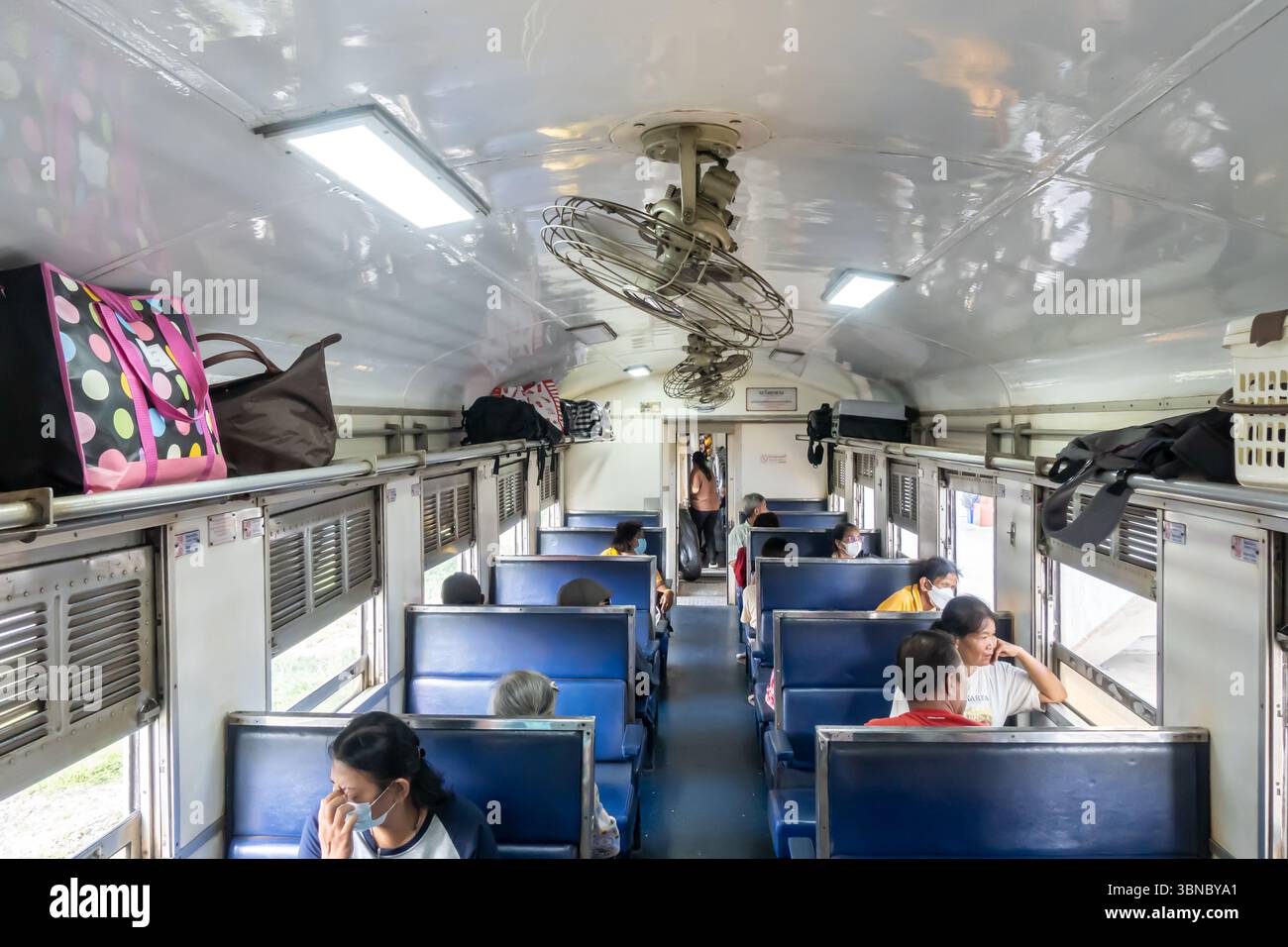 Train Using Fan Types Thailand train interior, 3rd class, fan Stock Photo - Alamy
