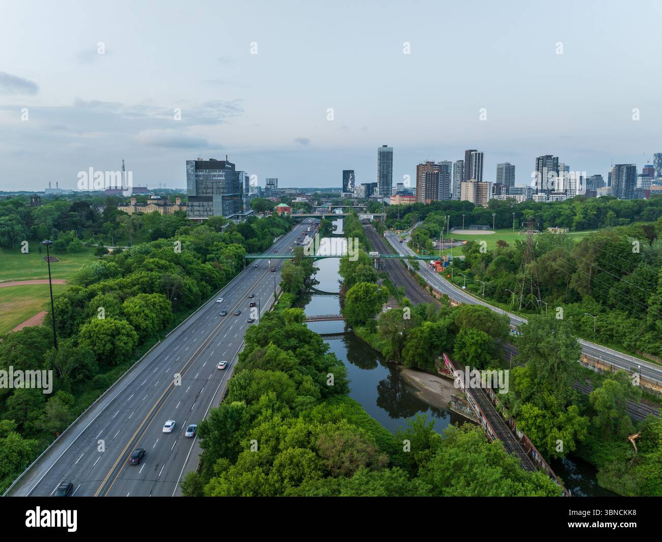 An aerial view above the Don Valley river, alongside the Don Valley Parkway in the early morning. Stock Photo