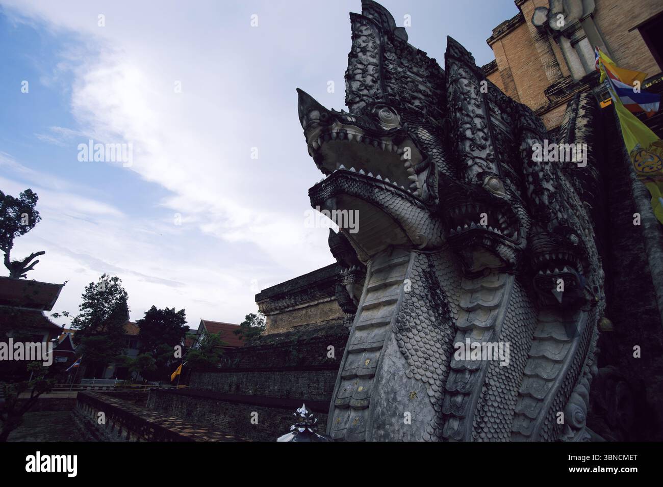 Stone Naga Guardians at Wat Chedi Luang, Chiang Mai Stock Photo